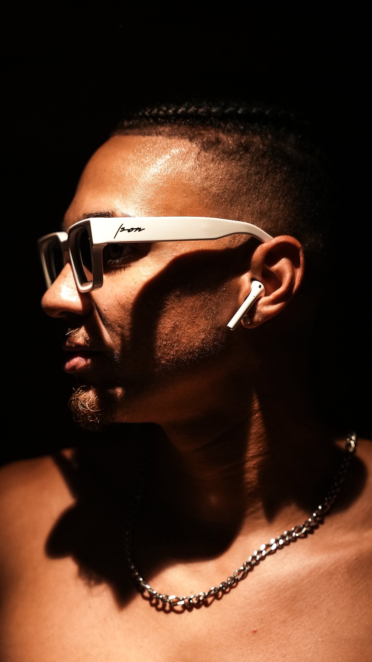 Lightskin man wearing Ison Couture Polar White bold square polarized sunglasses