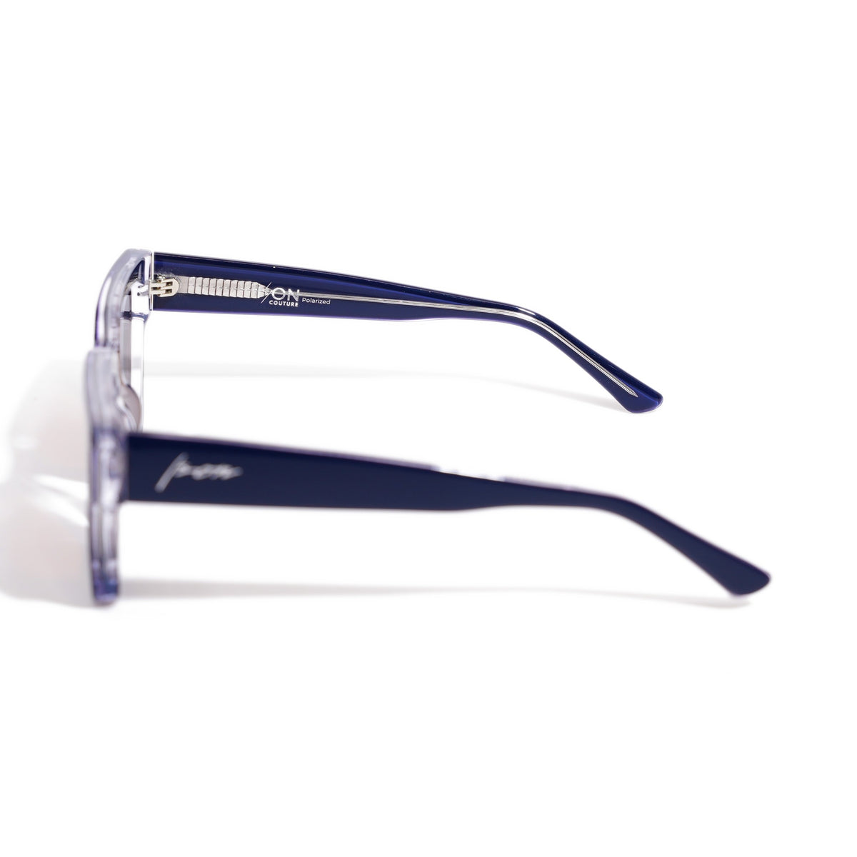 Fusion Navy Crystal side profile showing the metal core rod visible through the crystal clear temple interior
