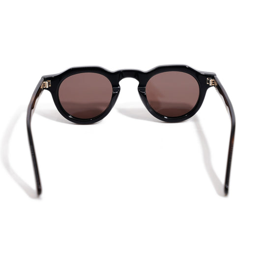 Round & Brown back view showing the amber acetate temples and metal hinges