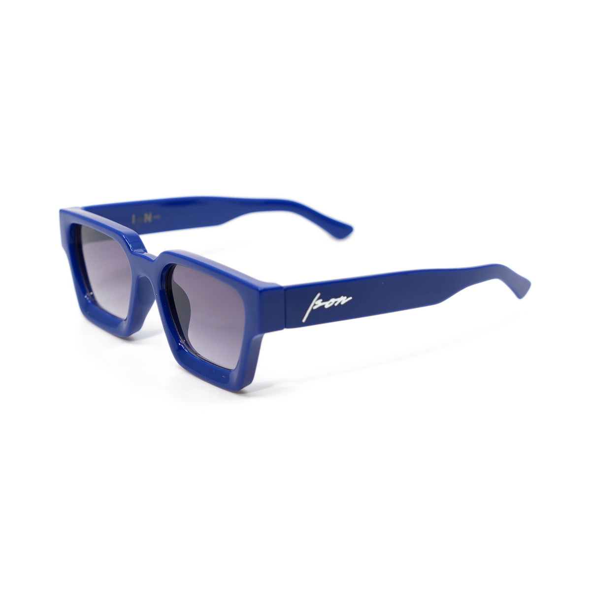 Ison Couture Royal Blue sunglasses, high-gloss royal blue square frame with smoke gradient lenses, three-quarter view