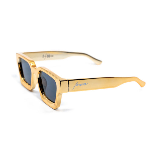 Ison Couture 24K Gold sunglasses, mirror-polished gold-tone square frame with dark smoke lenses, three-quarter view