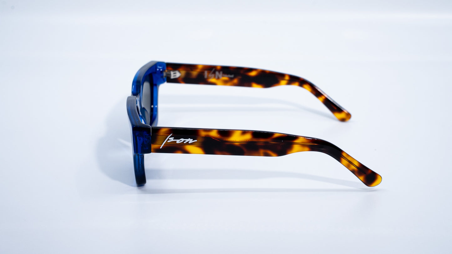 Ison Couture Blue Tortoise polarized sunglasses highlighting tortoise arms