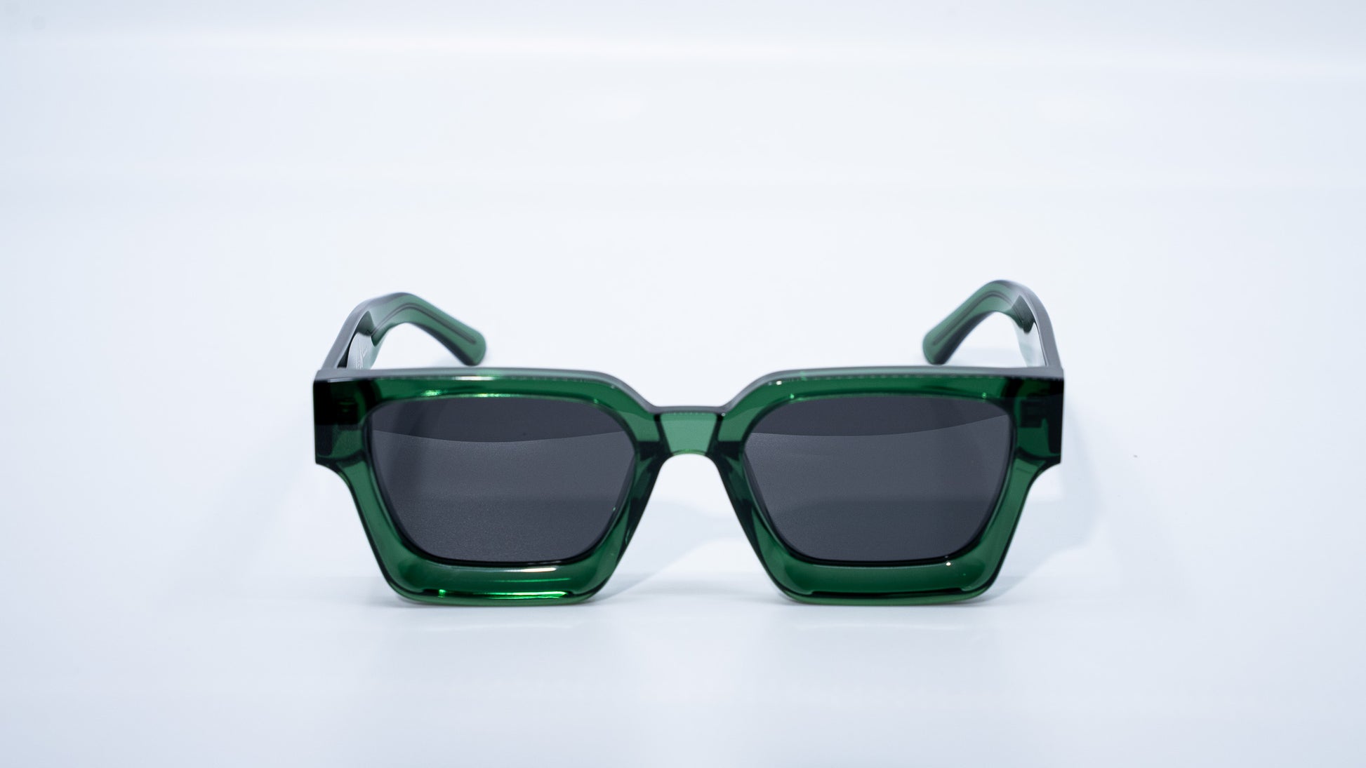 Ison Couture Eco Green polarized sunglasses front view with deep green bio-acetate frame