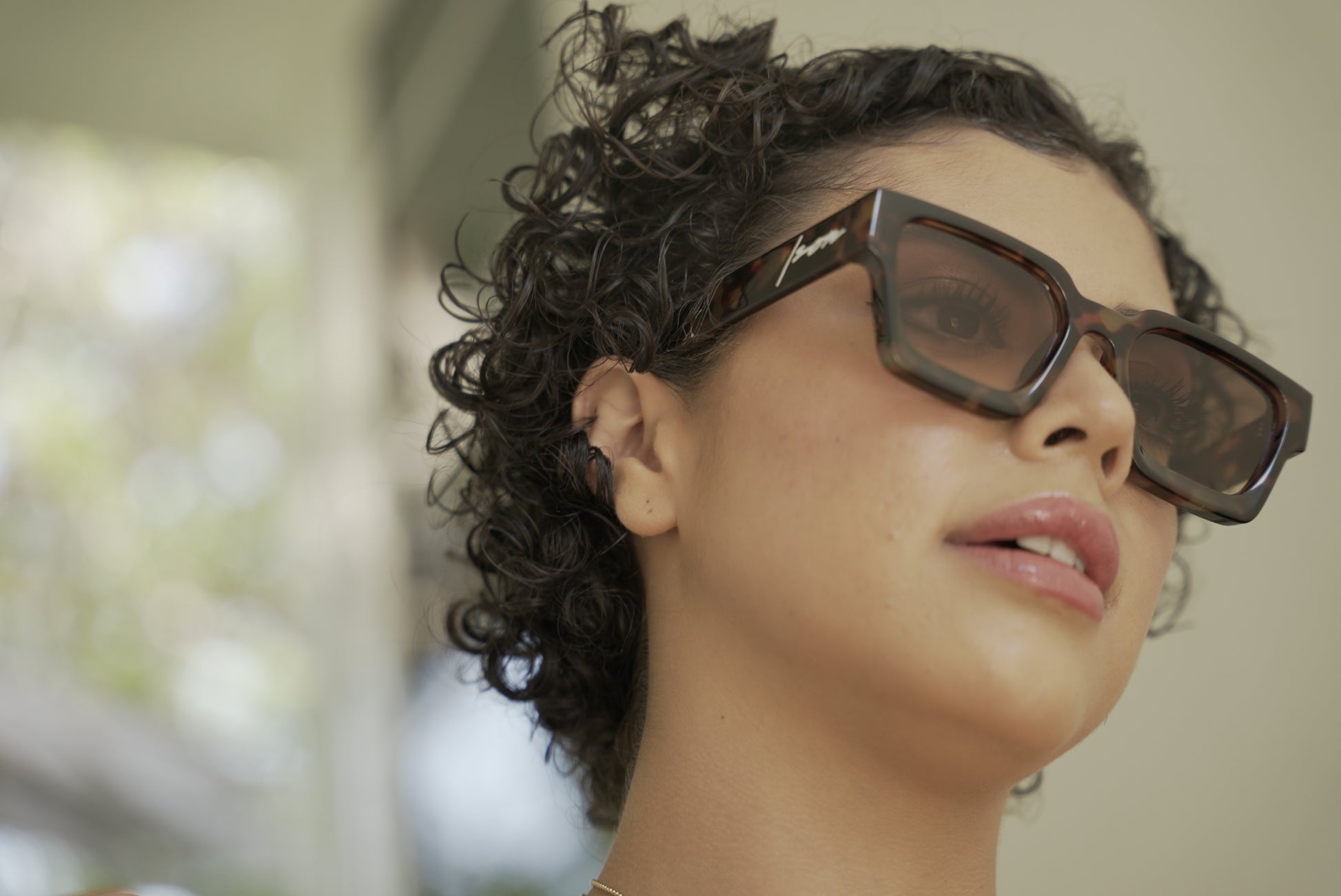 Miami Model wearing Ison Couture Tigers Eye tortoise bold square sunglasses
