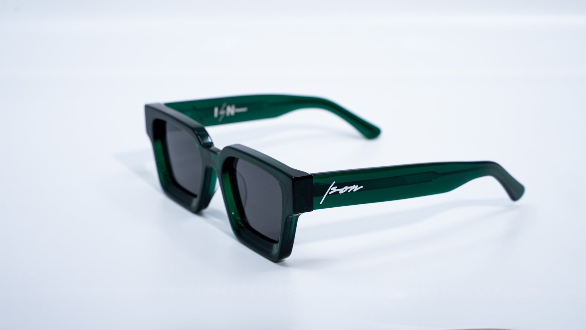 Ison Couture Emerald Green plant-based polarized square sunglasses side angle view