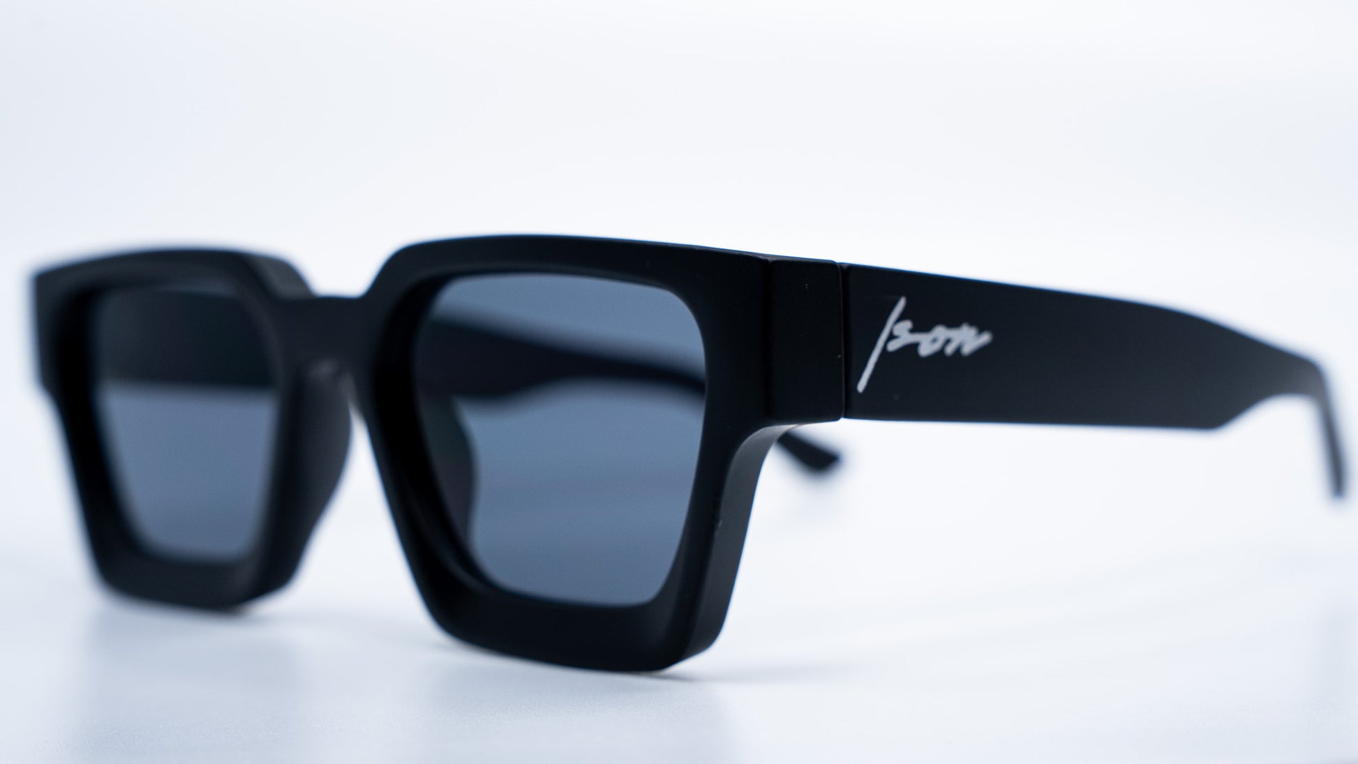 Ison Couture Matte Black square frame sunglasses side angle view
