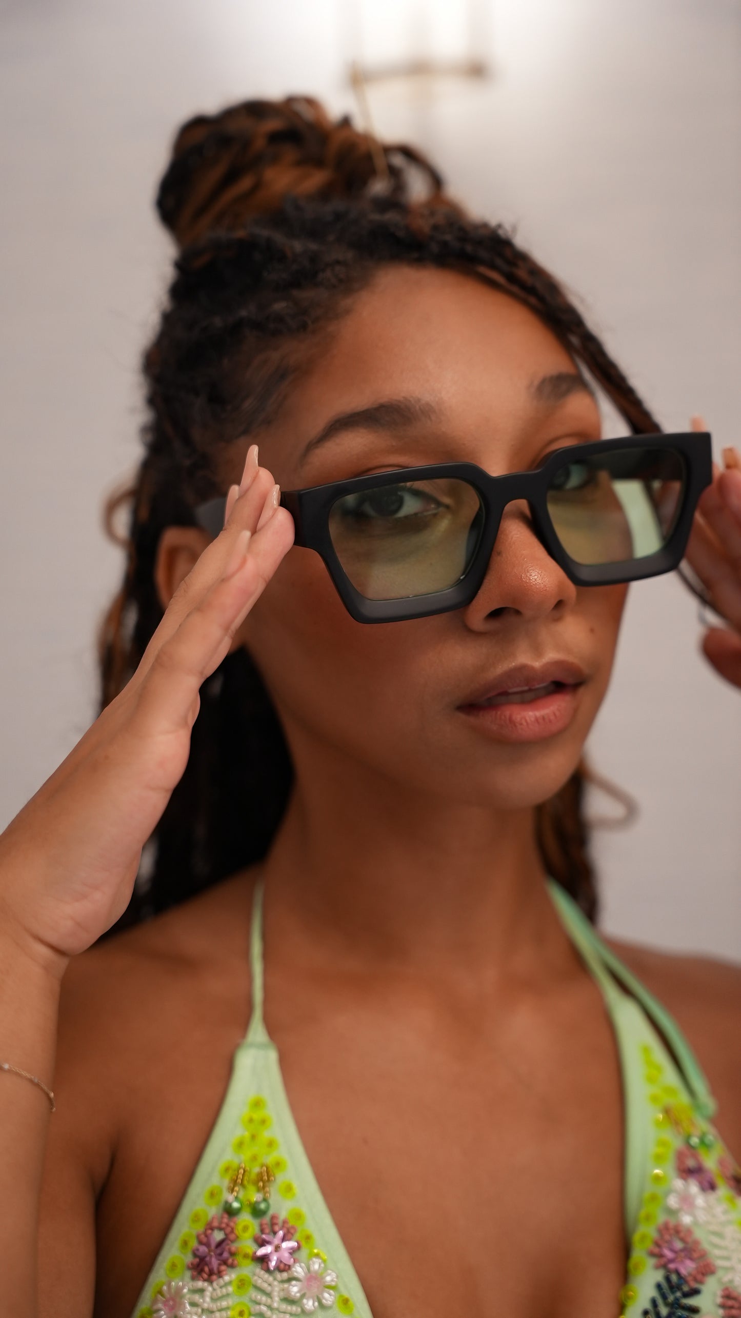 Miami Model wearing Ison Couture Matte Mint bold square sunglasses with green lenses in green bikini