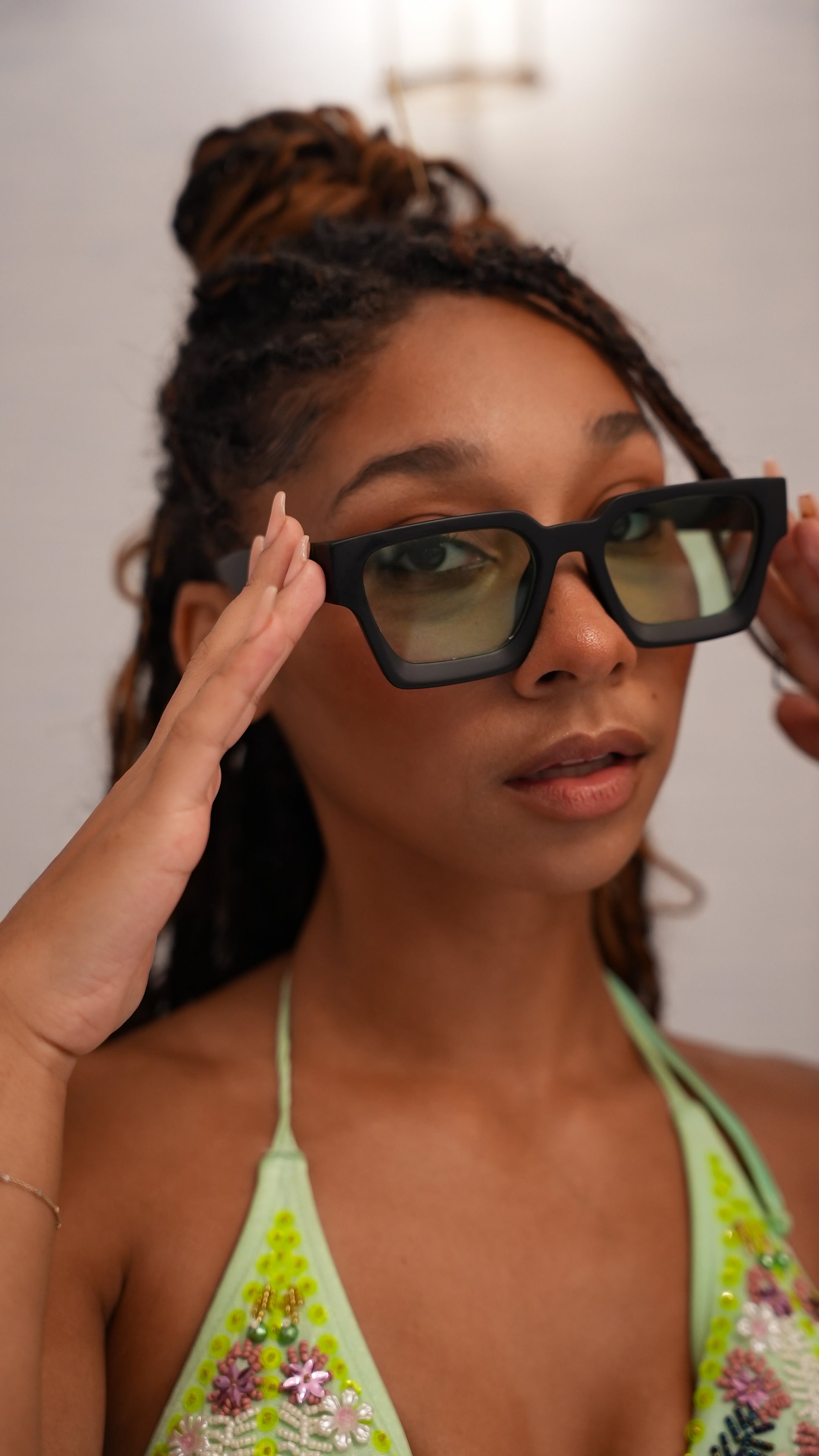 Miami Model wearing Ison Couture Matte Mint bold square sunglasses with green lenses in green bikini