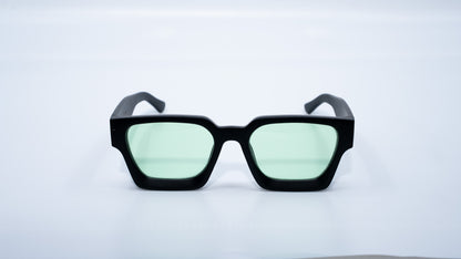 Ison Couture Matte Mint sunglasses front view showing matte black frame and minty green lenses
