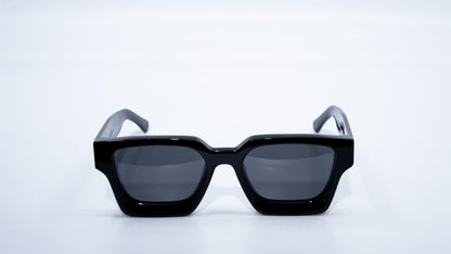 Ison Couture Polar Black polarized sunglasses front view showing bold all-black frame