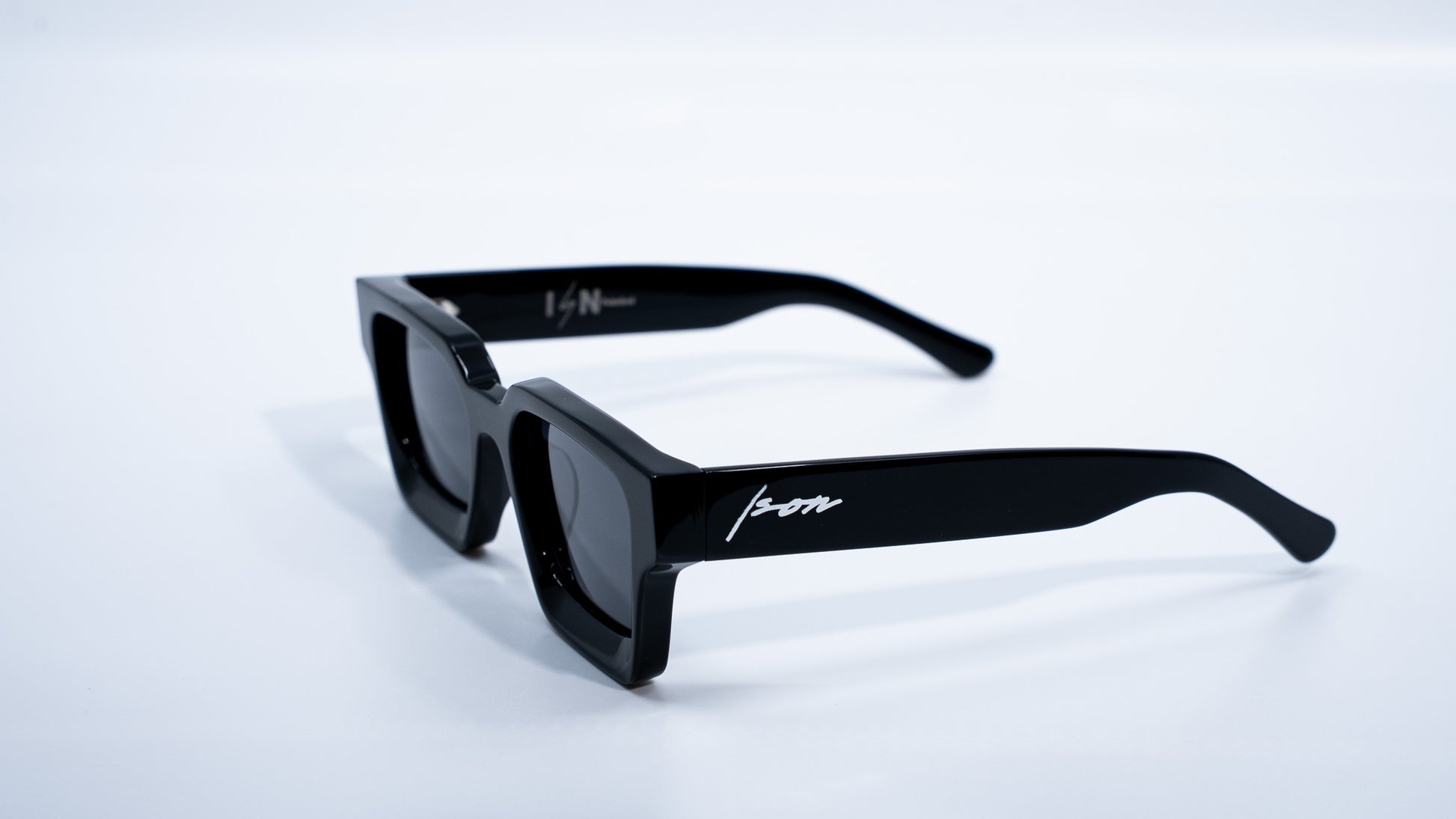 Ison Couture Polar Black plant-based polarized square sunglasses side angle view
