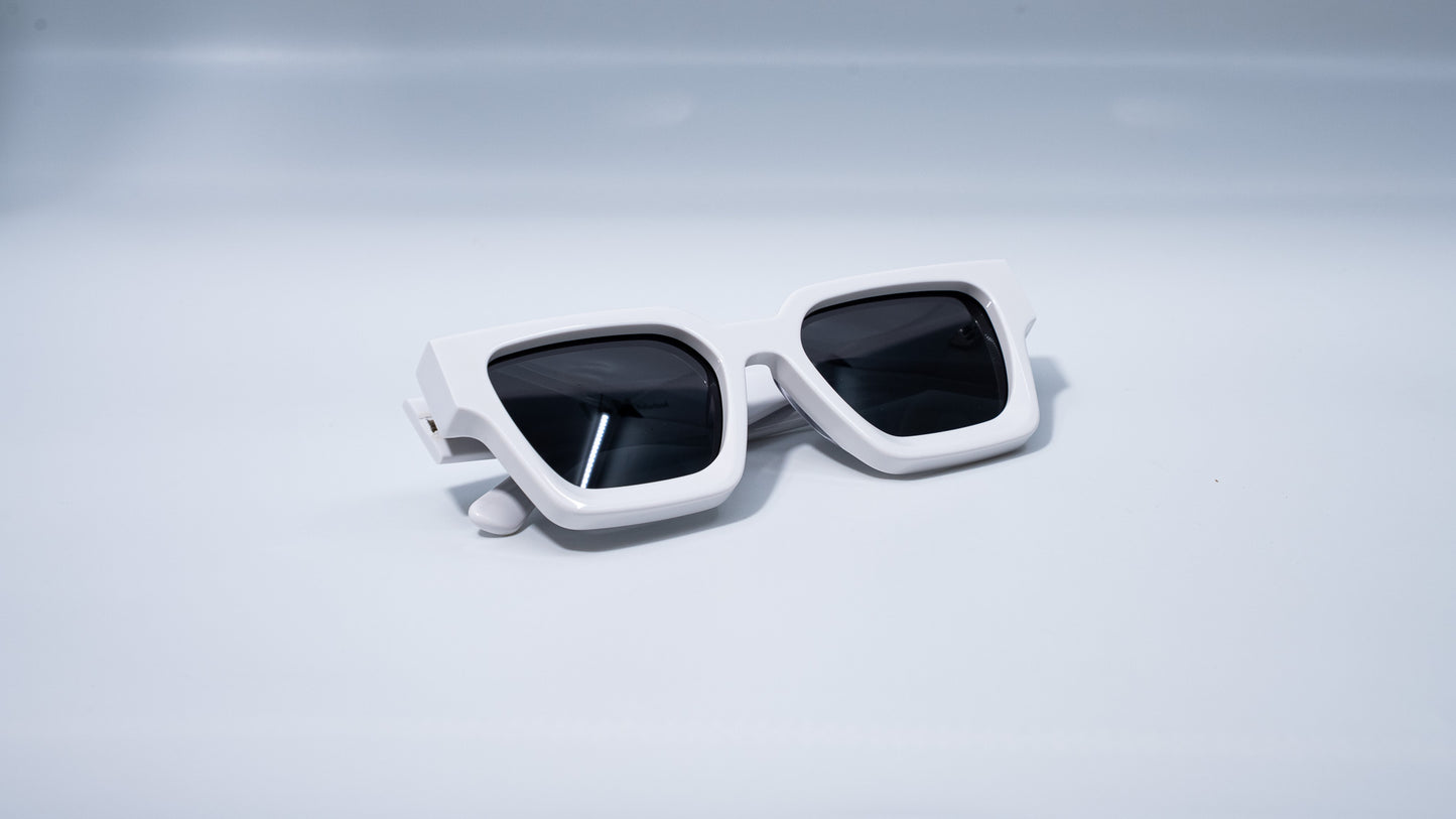 Ison Couture Polar White polarized sunglasses folded on white background