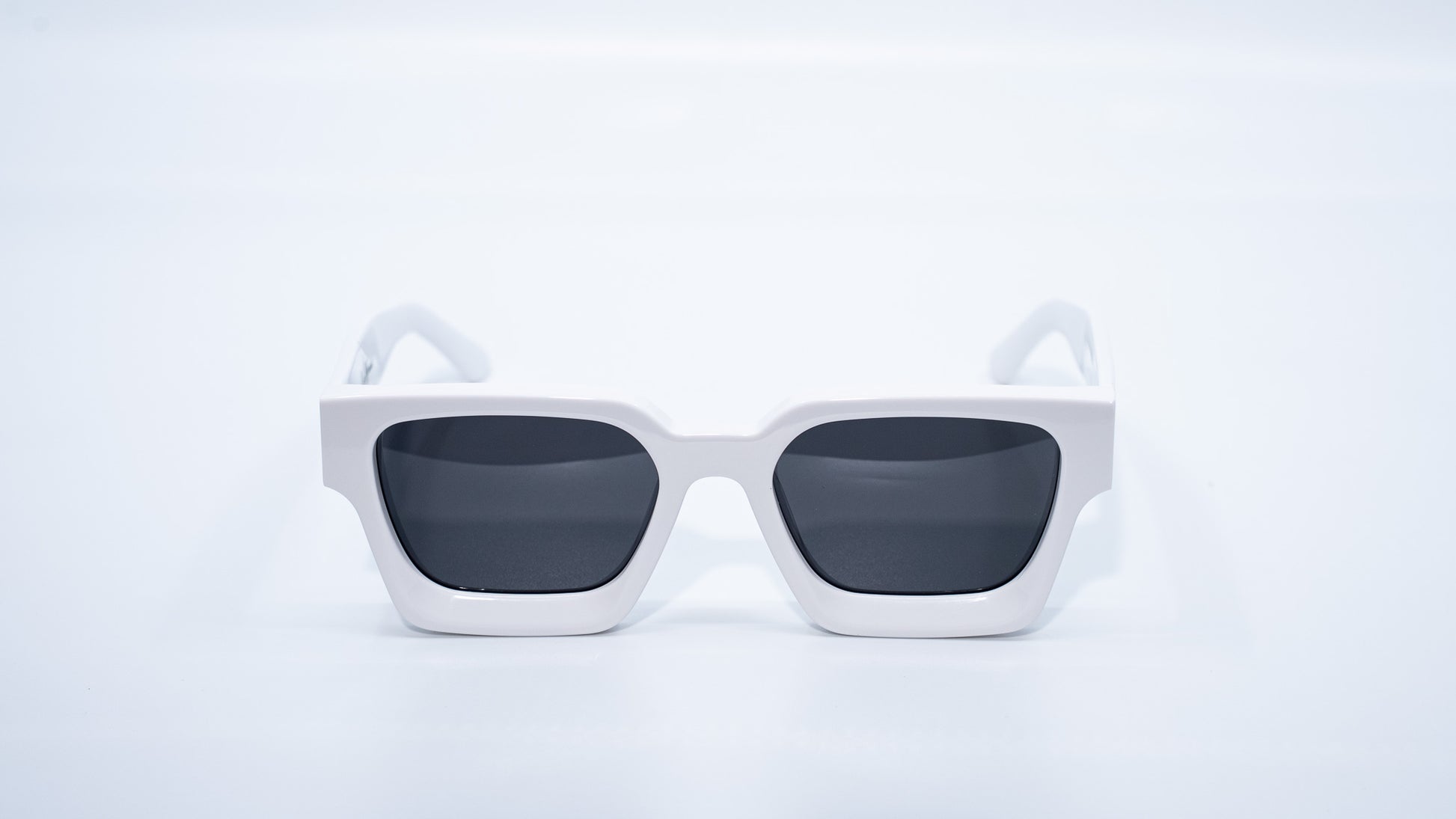 Ison Couture Polar White polarized sunglasses front view showing crisp white frame