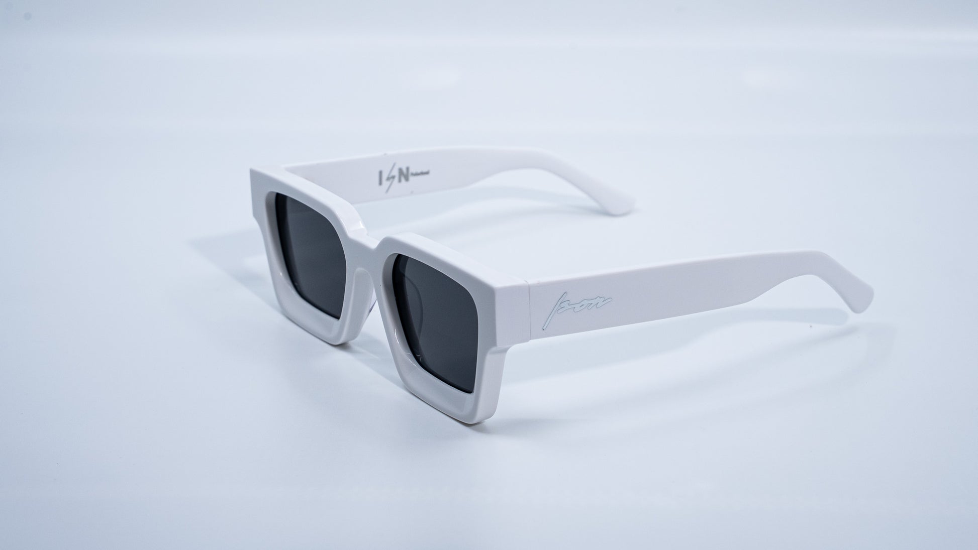 Ison Couture Polar White plant-based polarized square sunglasses side angle view
