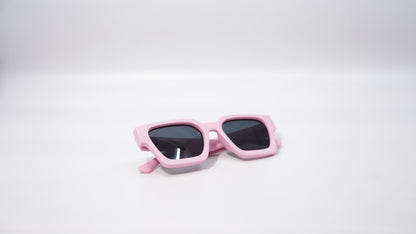 Ison Couture Soft barbie Pink sunglasses folded on white background