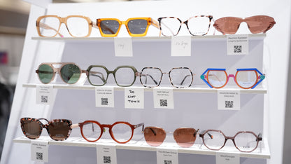 Ison Couture Citrus orange plant-based polarized sunglasses alongside other independent eyewear designers at Vision Expo 2026