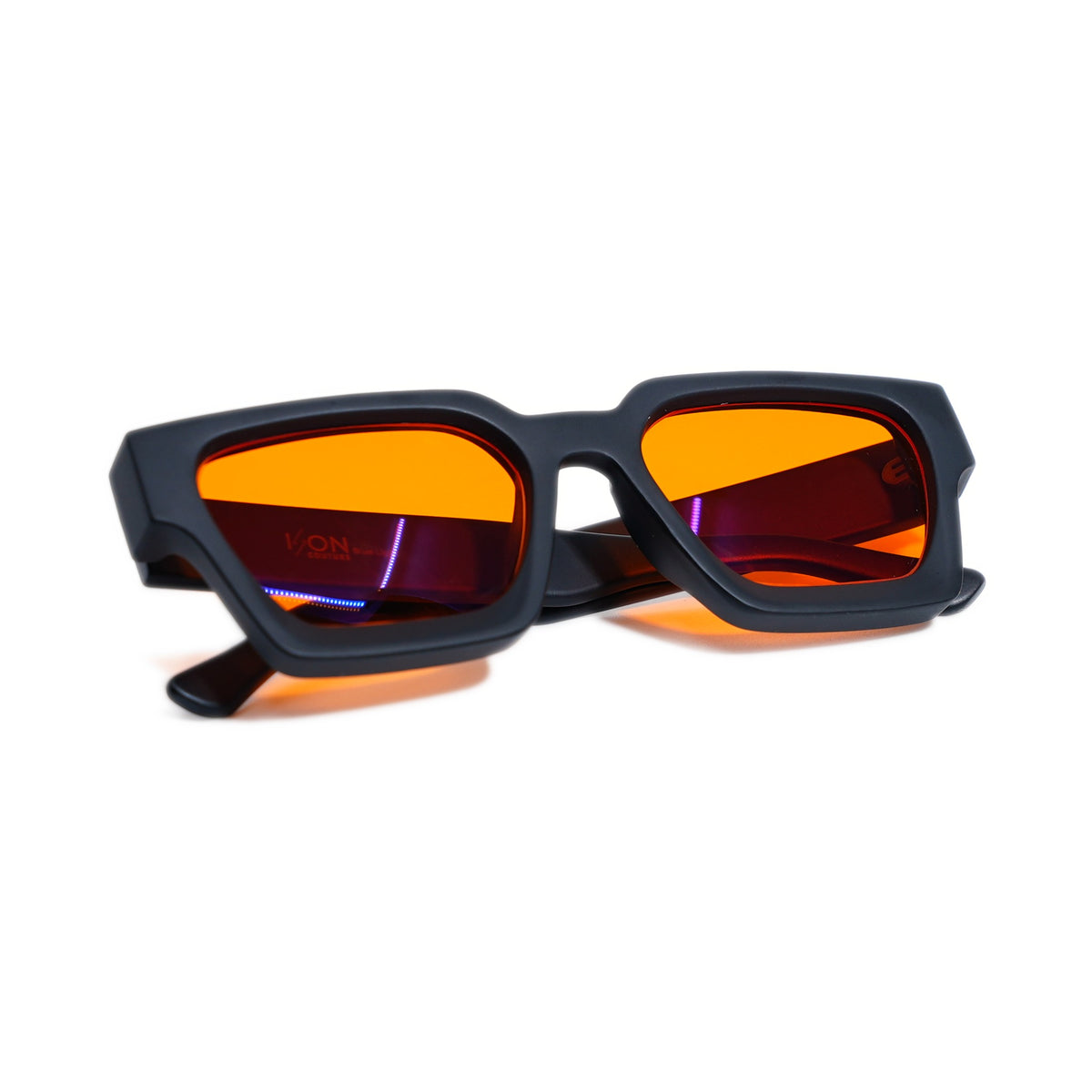AfterBurner blue light blocking glasses folded, matte black square frame with orange H9MX lenses