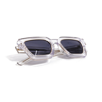 Crystal Clear & Gold sunglasses folded, showing the gold core rods through the transparent temples