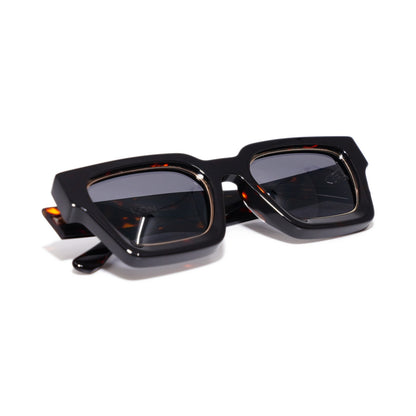 Dark Tortoise sunglasses folded, showing the gold-lined lens rims and dark tortoise acetate