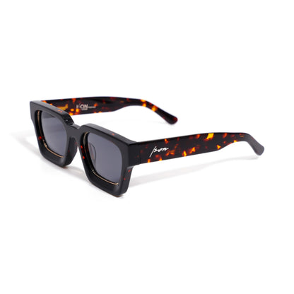 Ison Couture Dark Tortoise polarized sunglasses, deep tortoise bio-acetate square frame with amber flecks on the temples, three-quarter view
