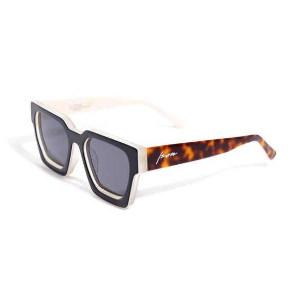 Ison Couture Fusion Calico polarized sunglasses, gloss black face over frosted ivory acetate with tortoise temples, three-quarter view