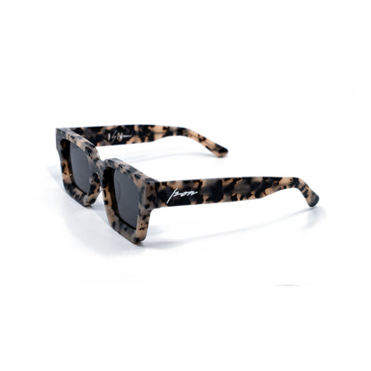 Ison Couture Granite polarized sunglasses, sand and blush bio-acetate with charcoal flecks, three-quarter view