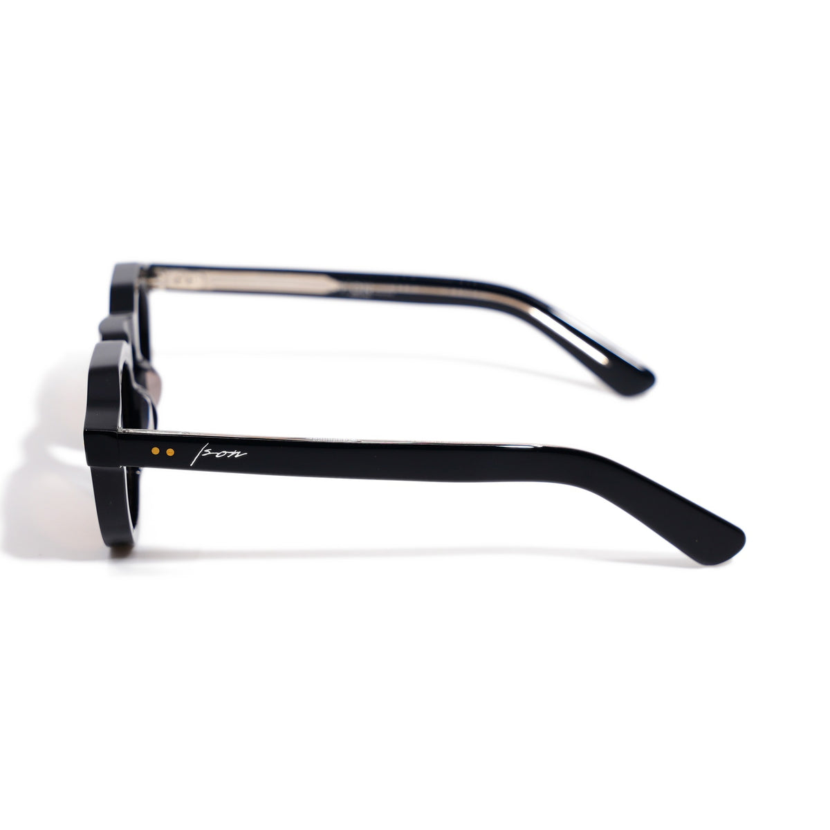 Round Black & Gold side profile with twin gold pins and Ison signature on the gloss black temple