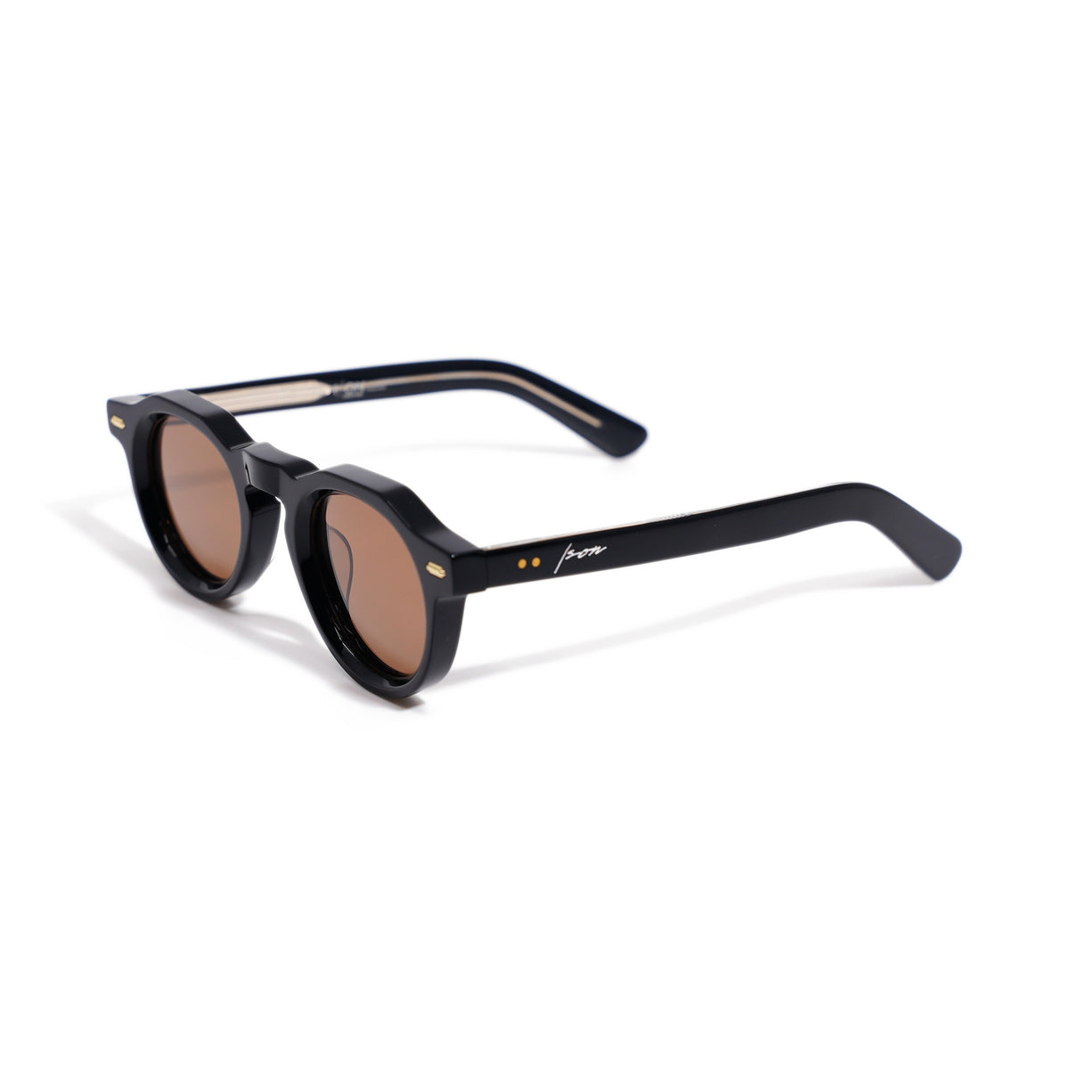 Ison Couture Round Black & Gold polarized sunglasses, gloss black bio-acetate with gold hinge rivets and keyhole bridge, three-quarter view