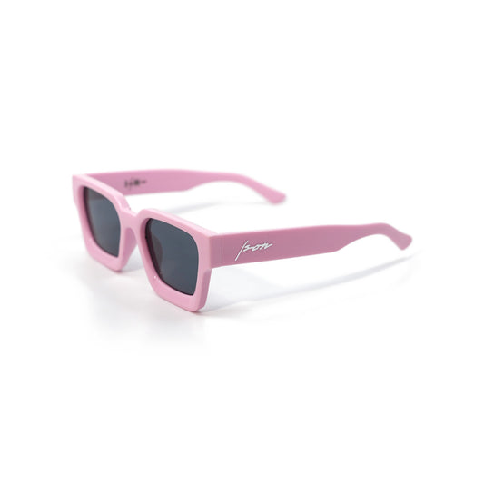 Ison Couture Soft Pink sunglasses, matte powder pink square frame with dark smoke lenses, three-quarter view