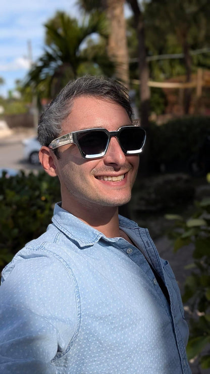 Man smiling wearing Ison Couture Chrome bold silver square sunglasses